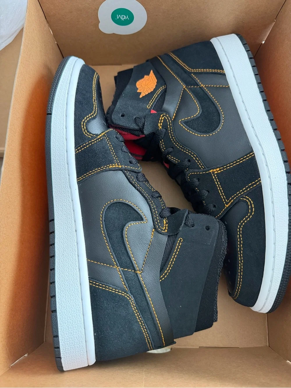 Nike Black High-Top Sneakers with Orange Stitching
